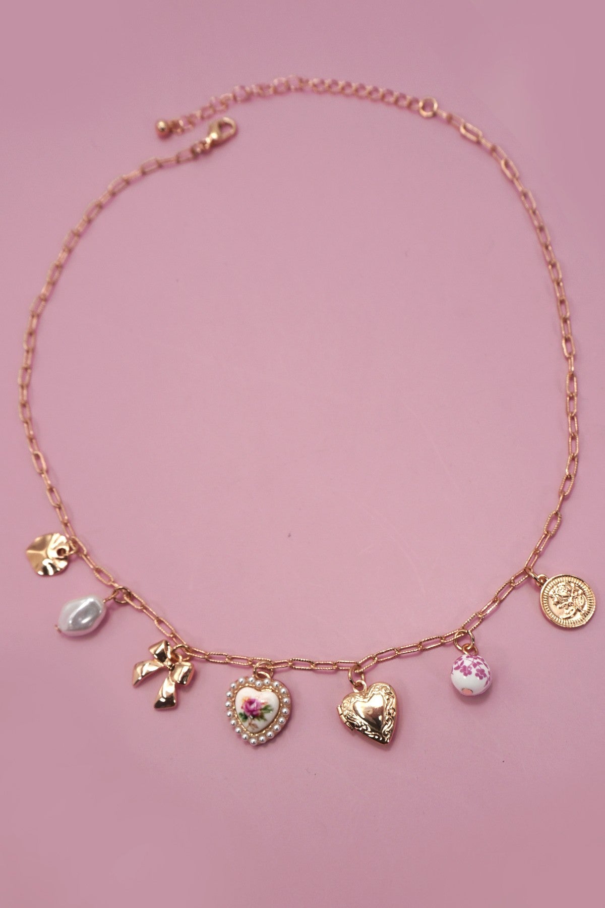 Bow and Heart Charm Necklace in Gold