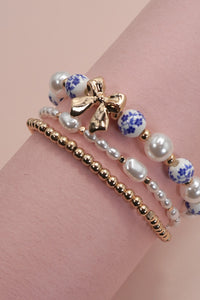 Bow and Pearl Multi Layer Bracelet Set