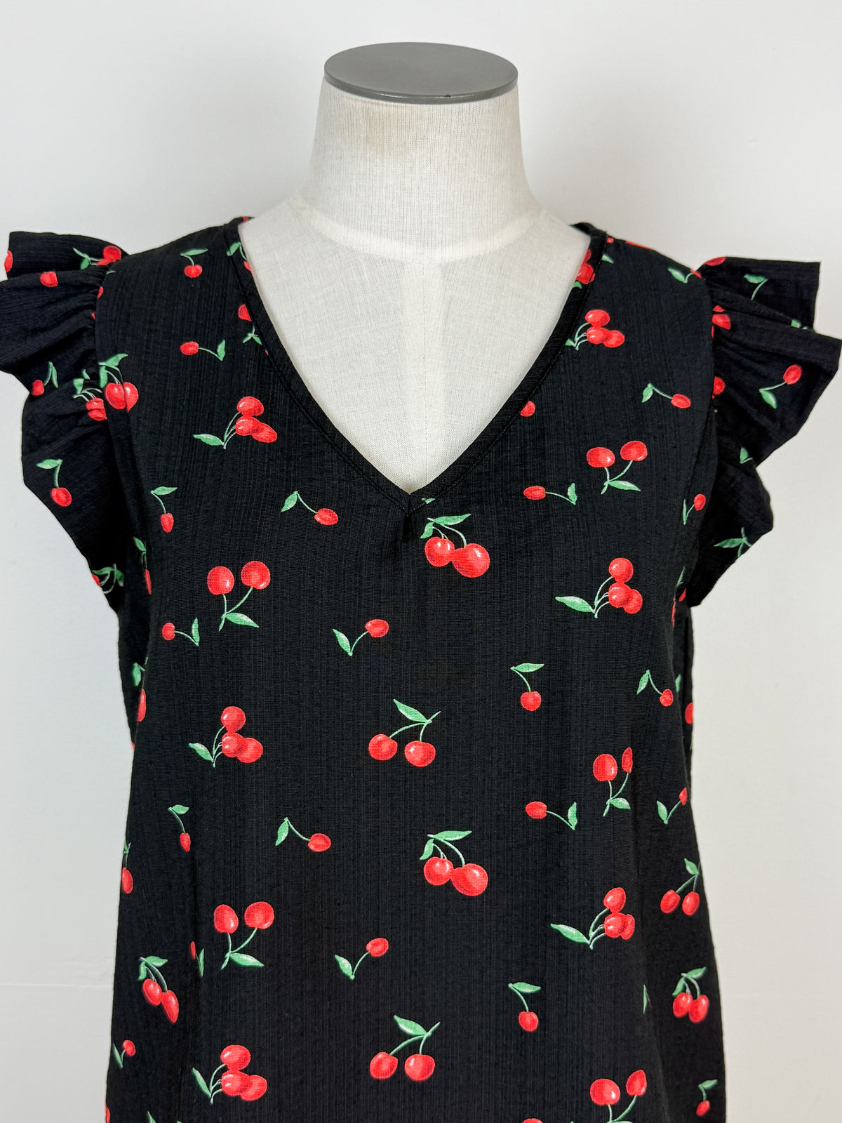 Ashley Cherry Ruffle Sleeve Top in Black