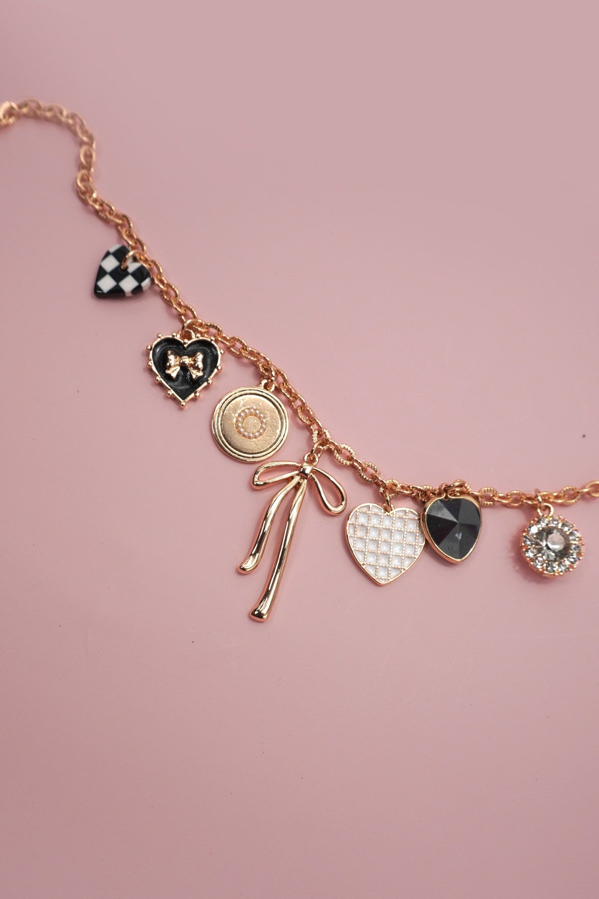 Bow and Heart Charm Necklace in Gold