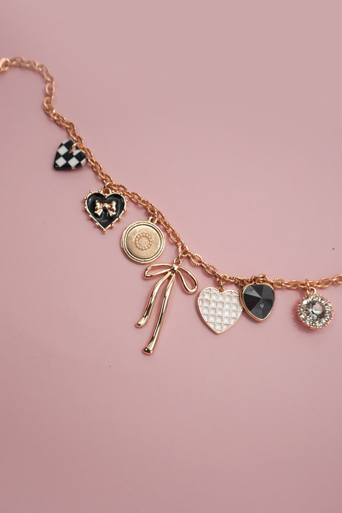 Bow and Heart Charm Necklace in Gold