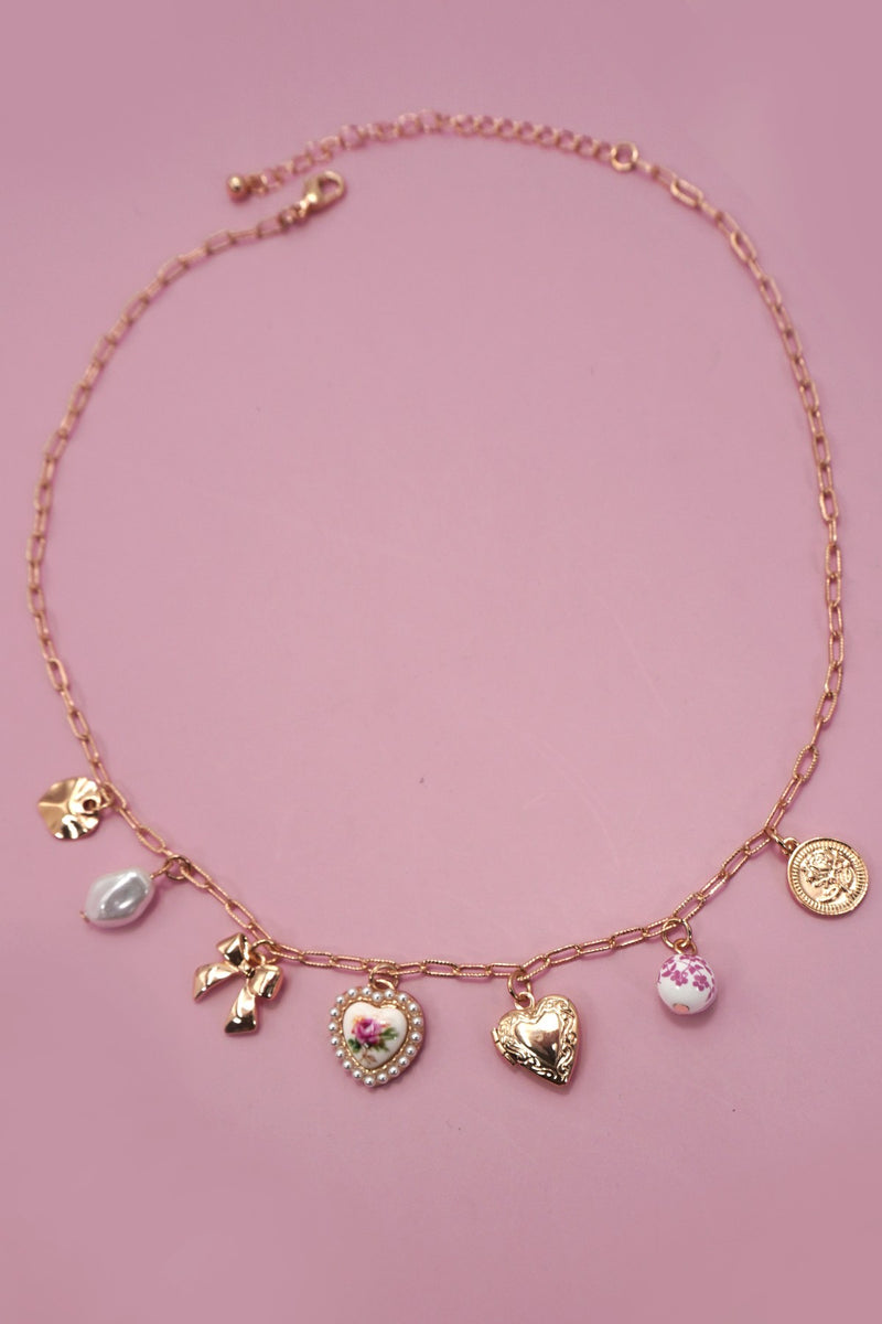 Bow and Heart Charm Necklace in Gold