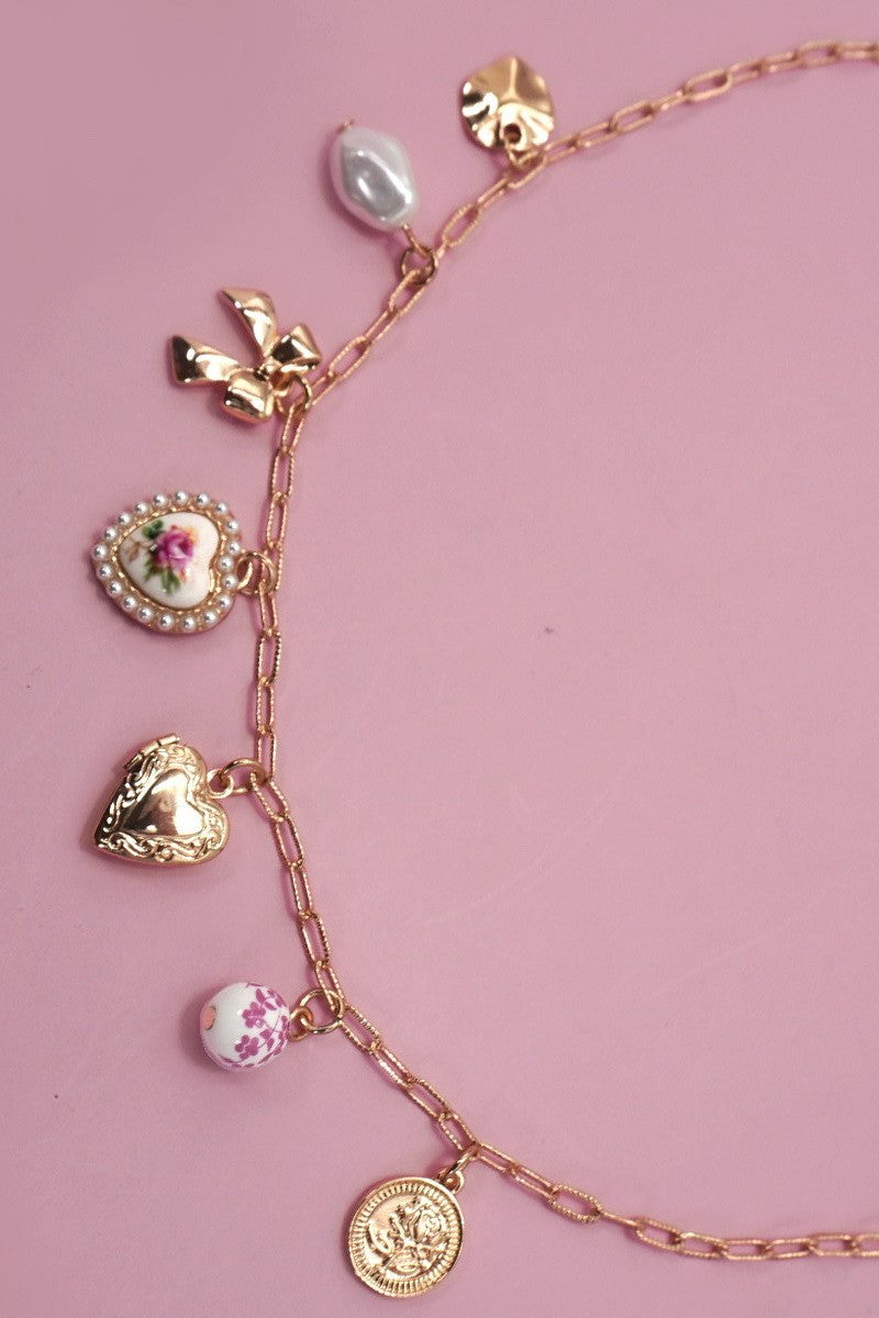 Bow and Heart Charm Necklace in Gold