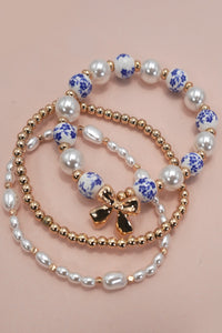 Bow and Pearl Multi Layer Bracelet Set