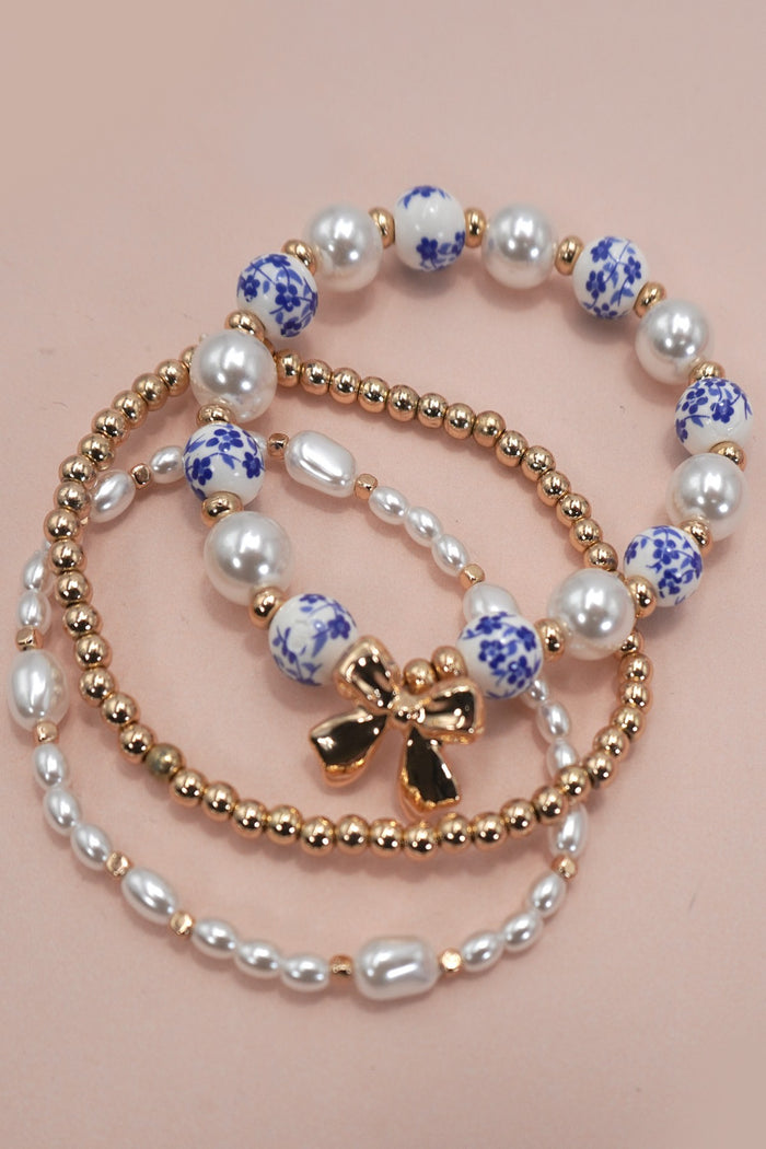 Bow and Pearl Multi Layer Bracelet Set