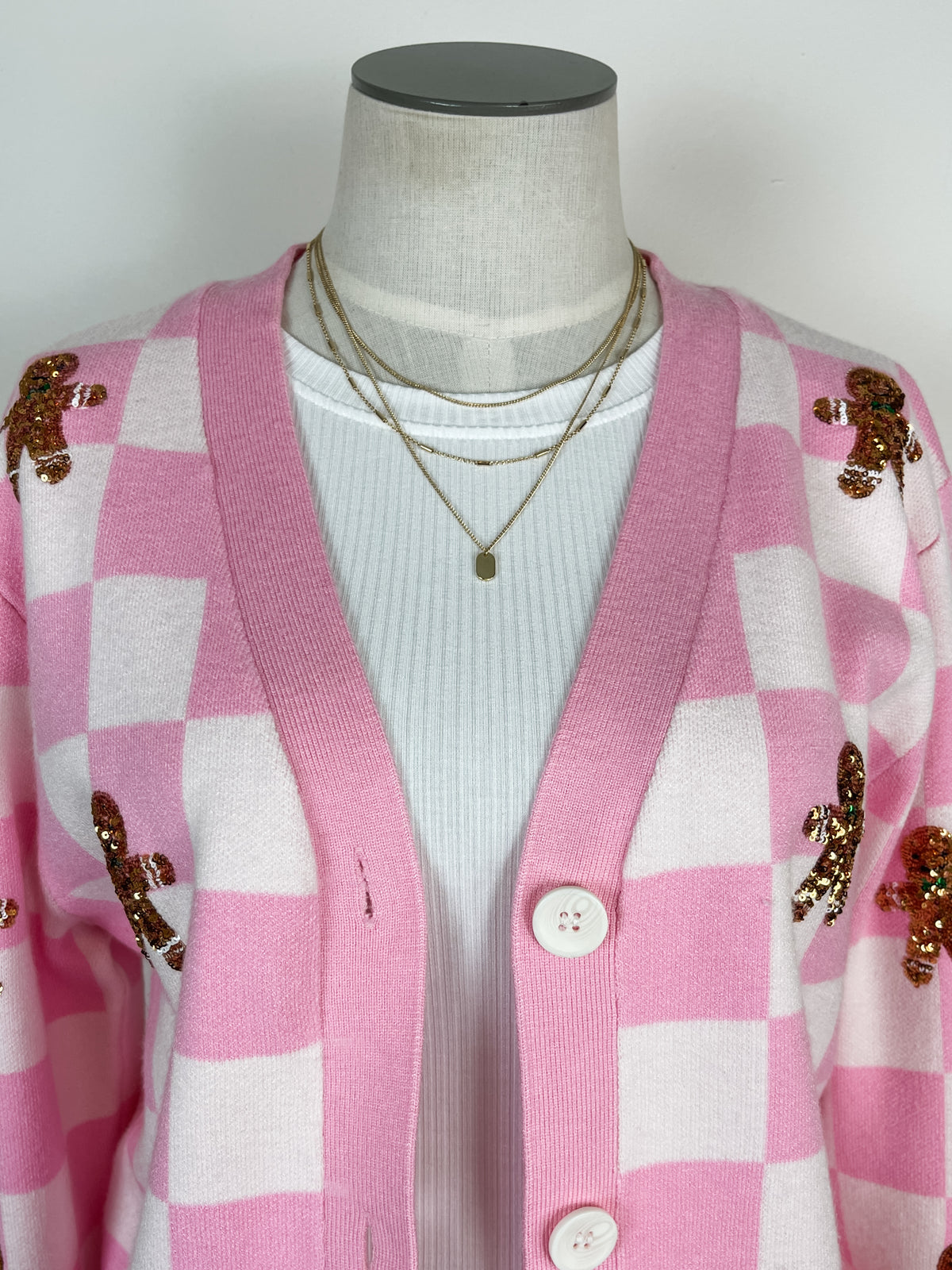 Gingerbread Man Checkered Christmas Cardigan in Pink