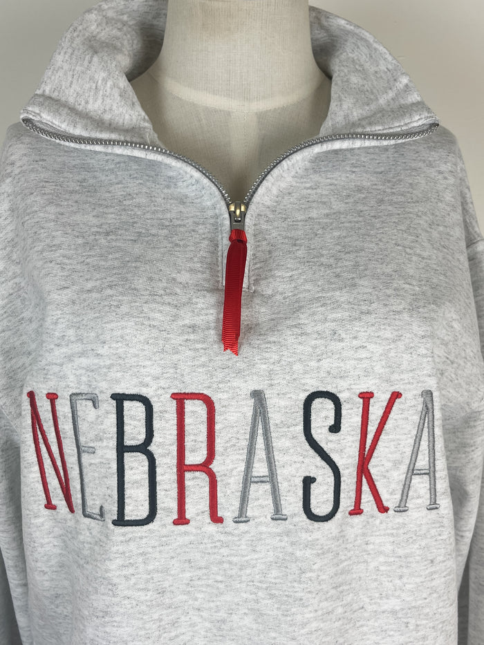 Nebraska Embroidered Quarter Zip in Grey