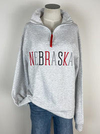 Nebraska Embroidered Quarter Zip in Grey