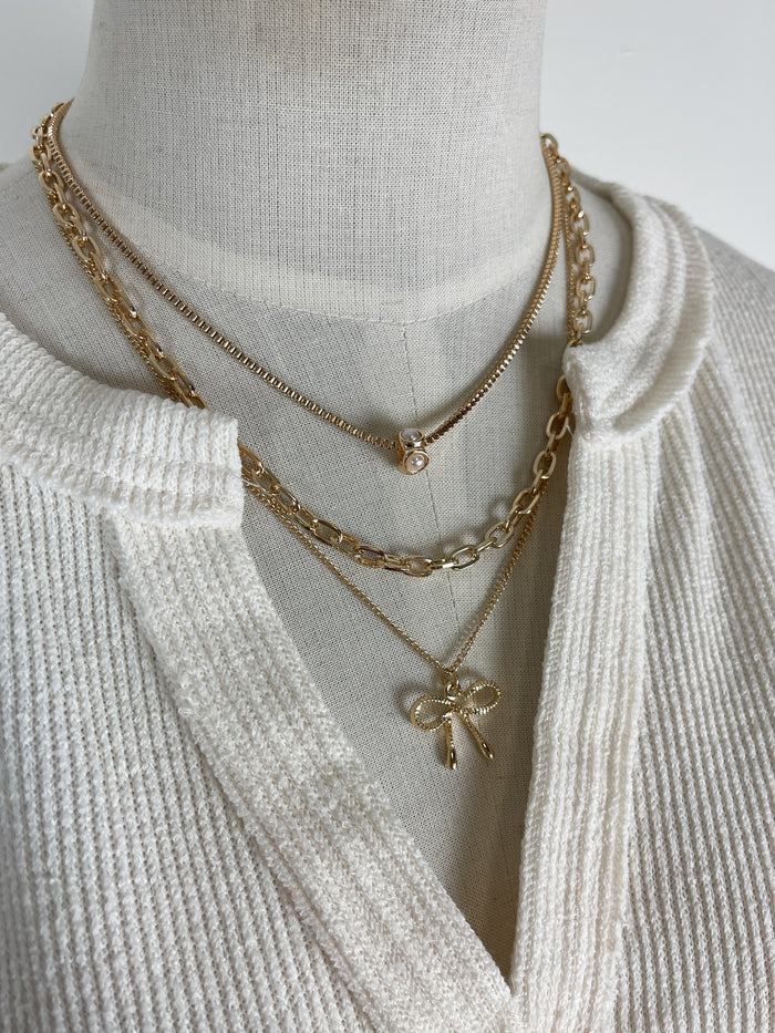 Multi Layer Bow Necklace in Gold