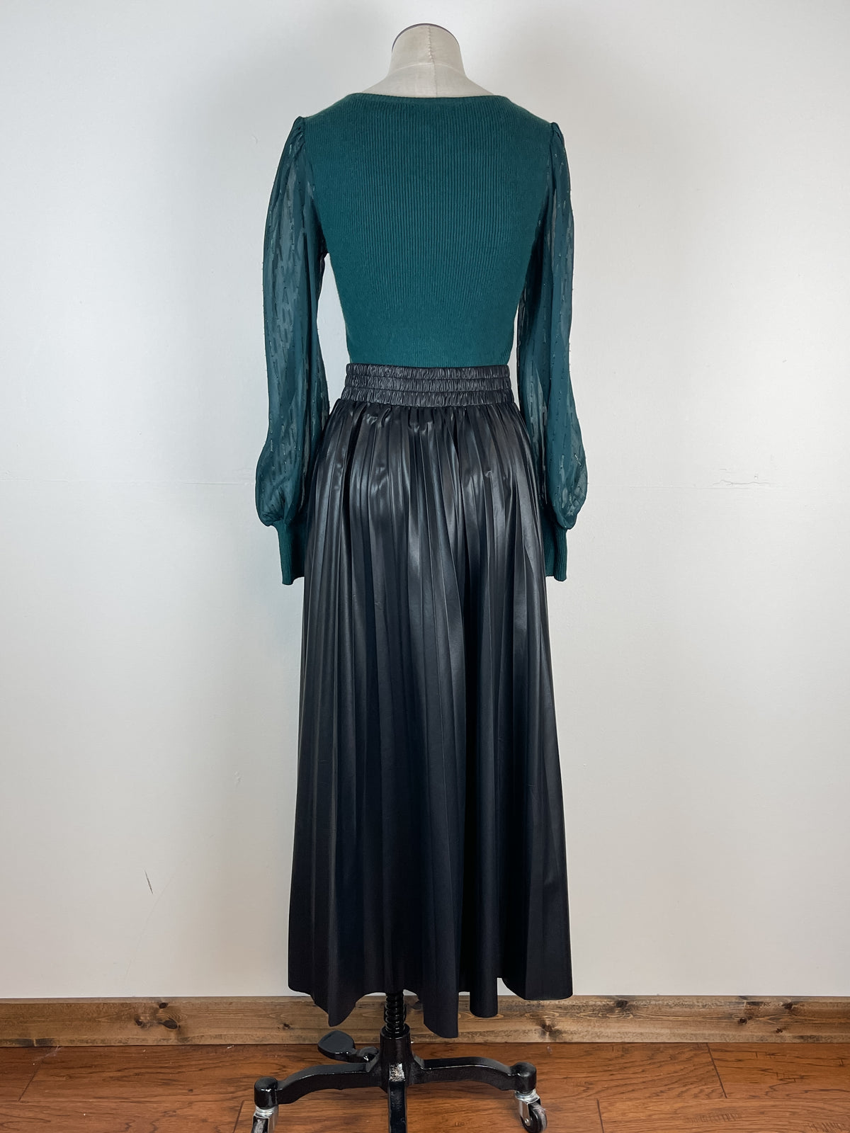 Anastasia Pleated Faux Leather Midi Skirt in Black