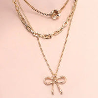 Multi Layer Bow Necklace in Gold